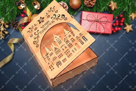 Laser Cut Christmas Jewelry Box — laser cut box Laser cut box with Christmas village design and engraved Merry Christmas text surrounded by festive decorations