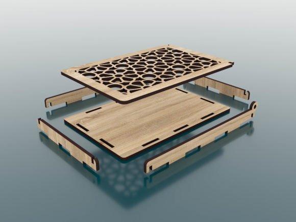 Easy Laser Cut Box Design Easy laser cut box with decorative patterned lid and wooden side panels laid out for assembly