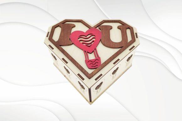 Heart-Shaped Laser Cut Jewelry Box Laser cut jewelry box in heart shape with I love you design and red heart hot air balloon detail