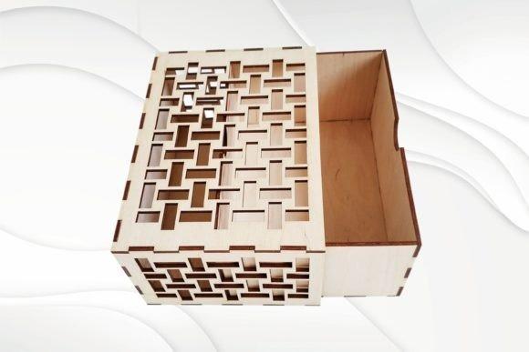 Patterned Plywood Laser Cut Wood Box Laser cut wood box with patterned plywood lid and plain wooden drawer open on white background
