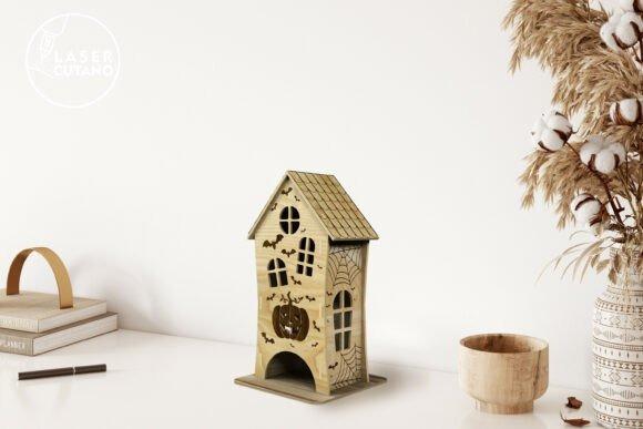 Halloween Laser Cut Lantern House — halloween laser cut designs Halloween laser cut designs lantern house with bats, pumpkin, spider web, and windows on white table