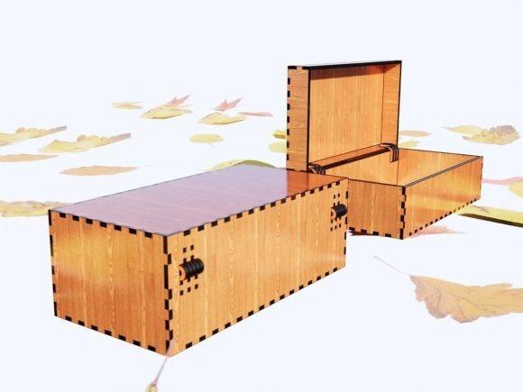 Laser Cut Jewelry Box Laser cut jewelry box with hinged lid and interlocking edges on a white background with scattered leaves