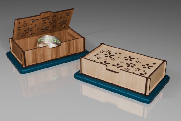 Laser Cut Jewelry Box Floral Design Laser cut jewelry box with floral pattern on lid, wooden with blue base, one open showing bracelet inside