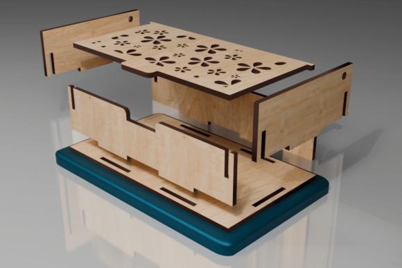 Laser Cut Jewelry Box with Floral Lid Laser cut jewelry box with floral pattern on the lid and simple side panels in natural wood
