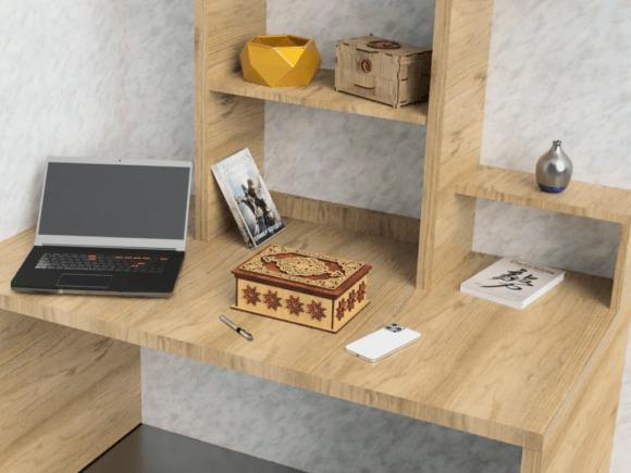Laser Cut Jewelry Box Laser cut jewelry box with decorative geometric patterns on a wooden desk with laptop and small items