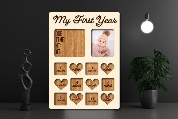 First-Year Photo Frame — laser cut decor ideas Laser cut decor ideas first-year photo frame with monthly photo slots and decorative text