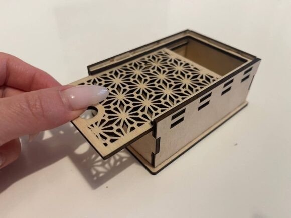 Easy Laser Cut Box with Geometric Lid Easy laser cut box with a geometric cutout lid featuring an intricate floral pattern in light wood
