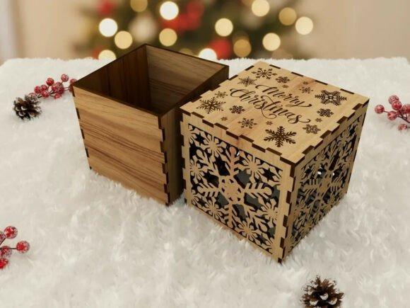 Laser Cut Gift Box Designs Laser cut gift box designs with snowflake patterns and Merry Christmas text on wooden box lid