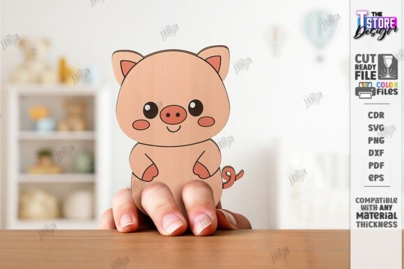 21 Laser Cut Toys for Kids and Creative Play 8 Finger puppet laser cut toy of a cartoon pig held on fingers for creative play — laser cut toys