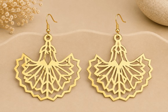 Laser cut wood earrings with intricate geometric floral design in light wood tone on beige background