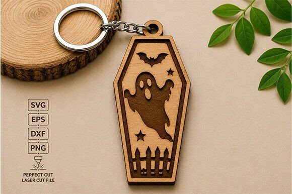 Halloween Laser Cut Keychain Halloween laser cut keychain shaped like a coffin with ghost, bat, stars, and fence cutouts