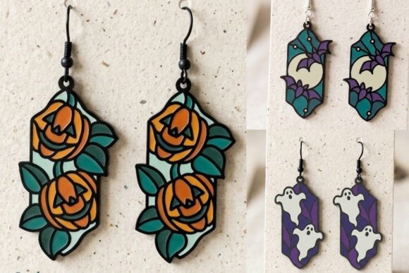 35 Halloween Laser Cut Wood Earrings Ideas 23 Halloween laser cut wood earrings featuring pumpkin, bat, and ghost designs in vibrant colors