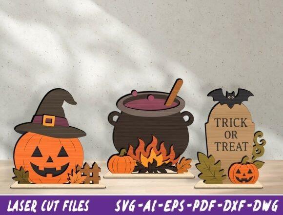 Halloween Laser Cut Trio Halloween laser cut designs including a pumpkin with witch hat, bubbling cauldron, and Trick or Treat tombstone with bat