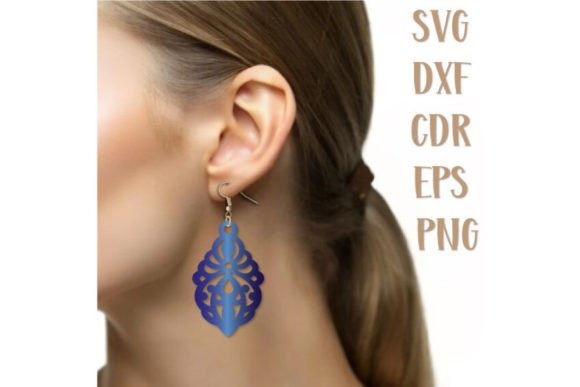 23 Laser Cut Wood Jewelry Ideas 29 Intricate laser cut wood jewelry lace earrings with decorative negative space worn on ear