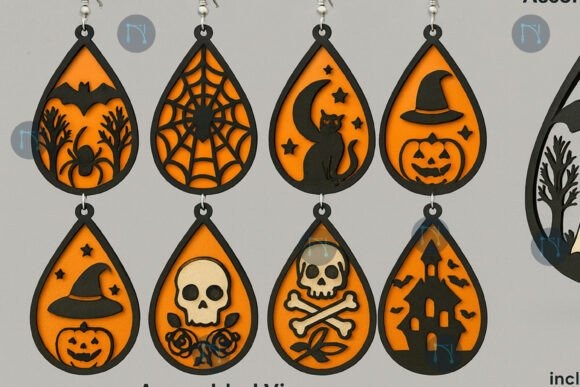 Laser cut wood earrings with Halloween-themed layered teardrop designs including bats, spiders, skulls, and pumpkins
