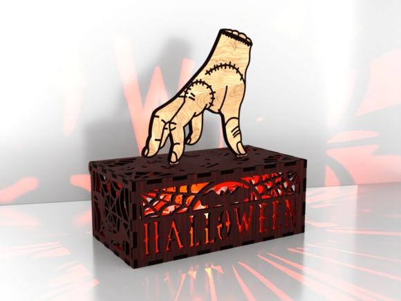 Halloween Laser Cut Lantern Halloween laser cut 3D lantern with stitched hand and graveyard scene casting shadows