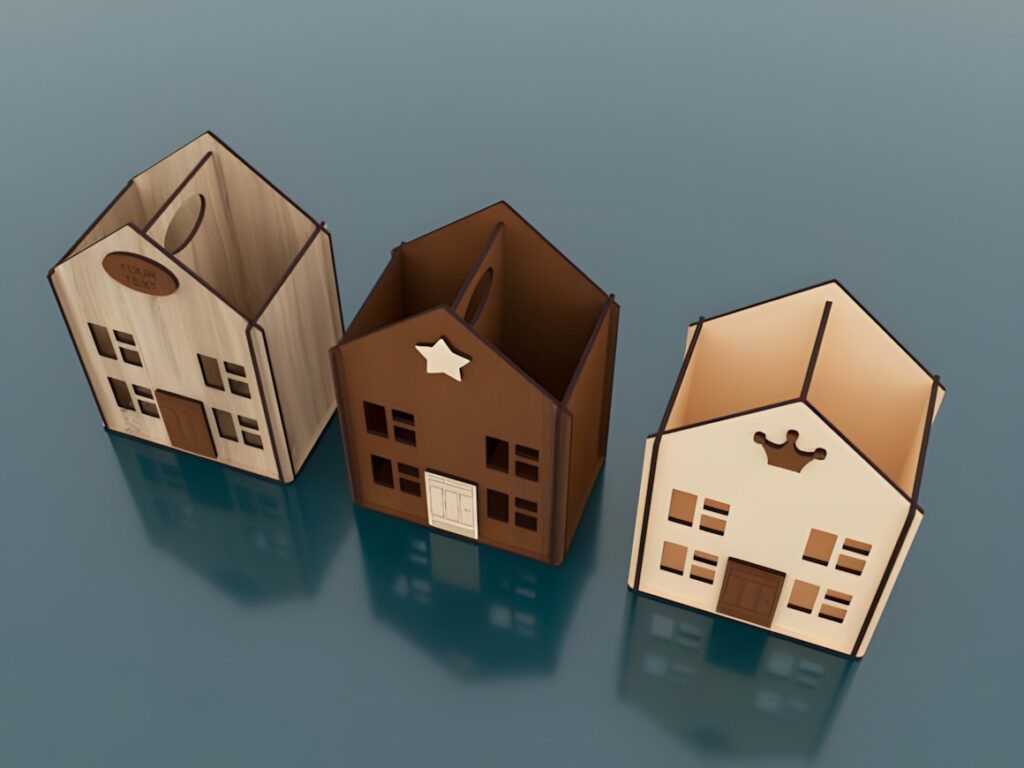 45 Laser Cut Files for Ready-to-Make Laser Projects 28 Three laser cut files of pencil holders shaped like small houses made from wood and acrylic materials
