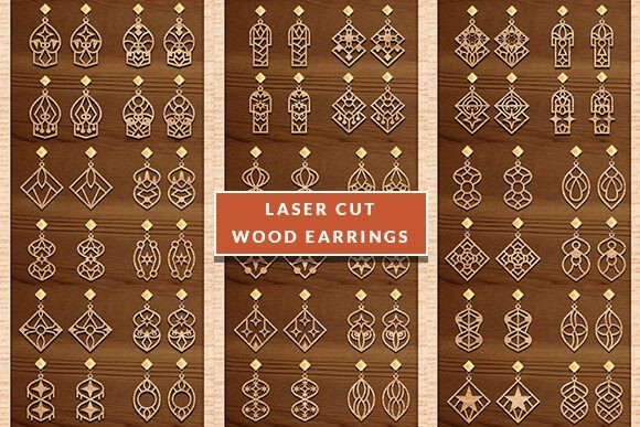 Laser cut wood earrings displayed in various geometric and ornamental designs on a wooden background