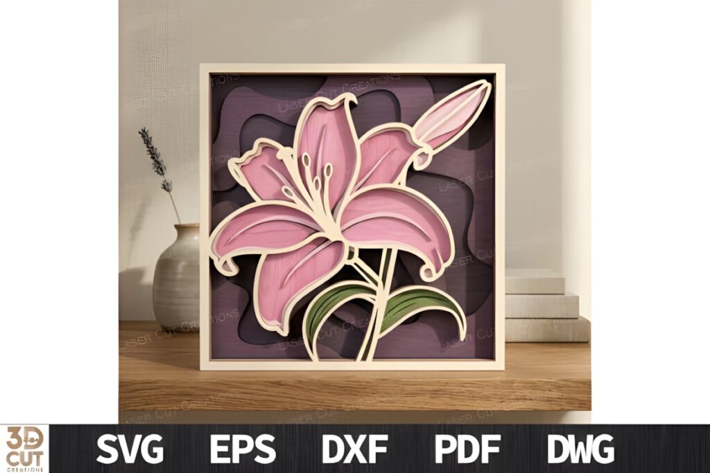 29 Laser Cut SVG Files for Wood, MDF and Acrylic Projects 44 Layered floral wall art made from laser cut SVG files for wood projects with pink flower and green leaves in shadow-box frame