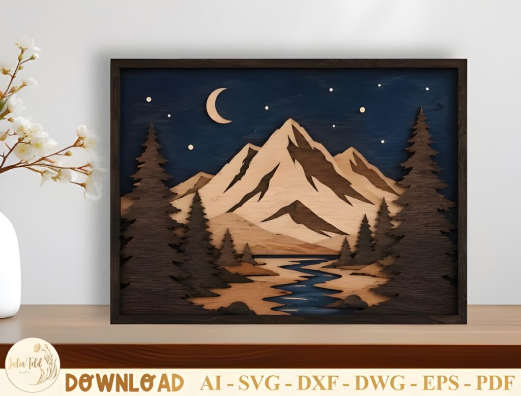 29 Laser Cut SVG Files for Wood, MDF and Acrylic Projects 3 Layered nature landscape created with laser cut SVG files for wood projects showing mountains, trees, river, and night sky