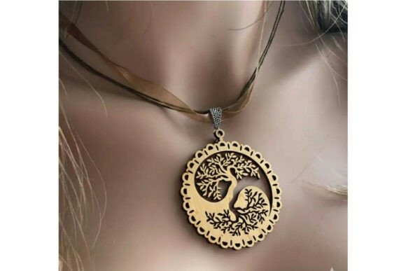 Laser cut necklace with intricate tree of life design on a round wooden pendant