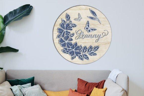 45 Laser Cut Panels for Indoor and Outdoor Features 35 Round multilayer laser cut panel with floral and butterfly design and the word Granny on a wall above a — laser cut panels