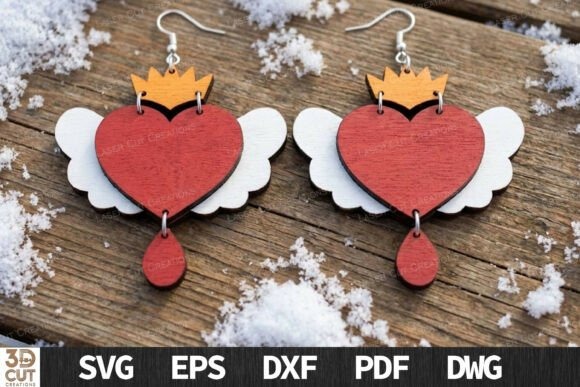 45 Best Laser Cut Acrylic Jewelry Ideas 27 Winged sacred heart earrings in red, white, and gold laser cut acrylic on wooden surface with — laser cut acrylic jewelry