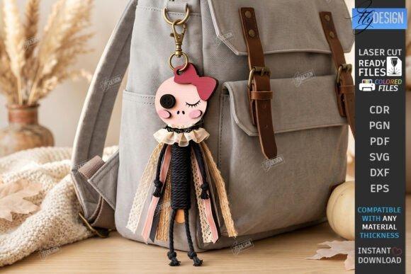 Laser Cut Halloween Keychain laser cut halloween keychain with skull face, pink bow, and ribbon body hanging on backpack