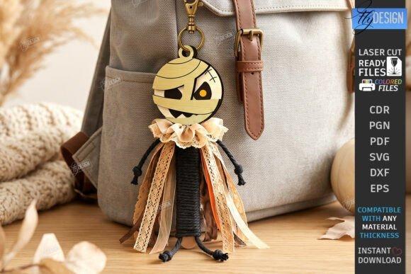 Wooden Halloween Laser Cut Keychain — laser cut halloween keychain laser cut halloween keychain wooden mummy design with muted neutral colors and asymmetrical facial details