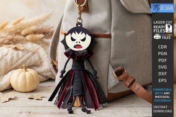 Laser Cut Halloween Keychain Vampire laser cut halloween keychain vampire design with black hair, pale face, and black-and-burgundy outfit hanging on beige bag