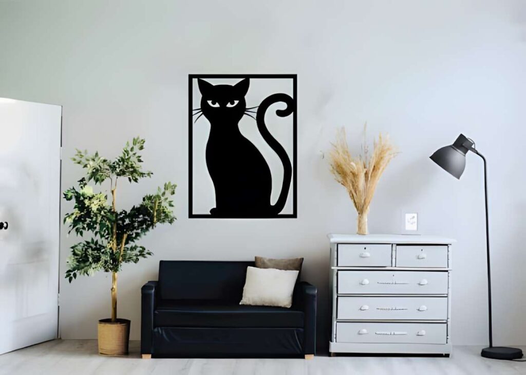 50 Laser Cut Steel Wall Art Ideas for Modern Home Decor 57 Laser cut steel wall art ideas featuring a black cat silhouette mounted on a white wall above a black sofa in a modern