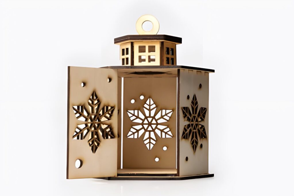 54 Christmas Laser Cut Files for Festive Laser Projects 39 Christmas Laser Cut Files wooden lantern with snowflake cutouts and open door