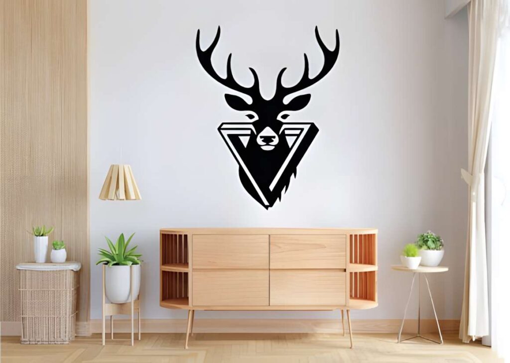 50 Laser Cut Steel Wall Art Ideas for Modern Home Decor 43 Laser cut steel wall art ideas featuring a black deer head with antlers mounted above a wooden sideboard in a modern room