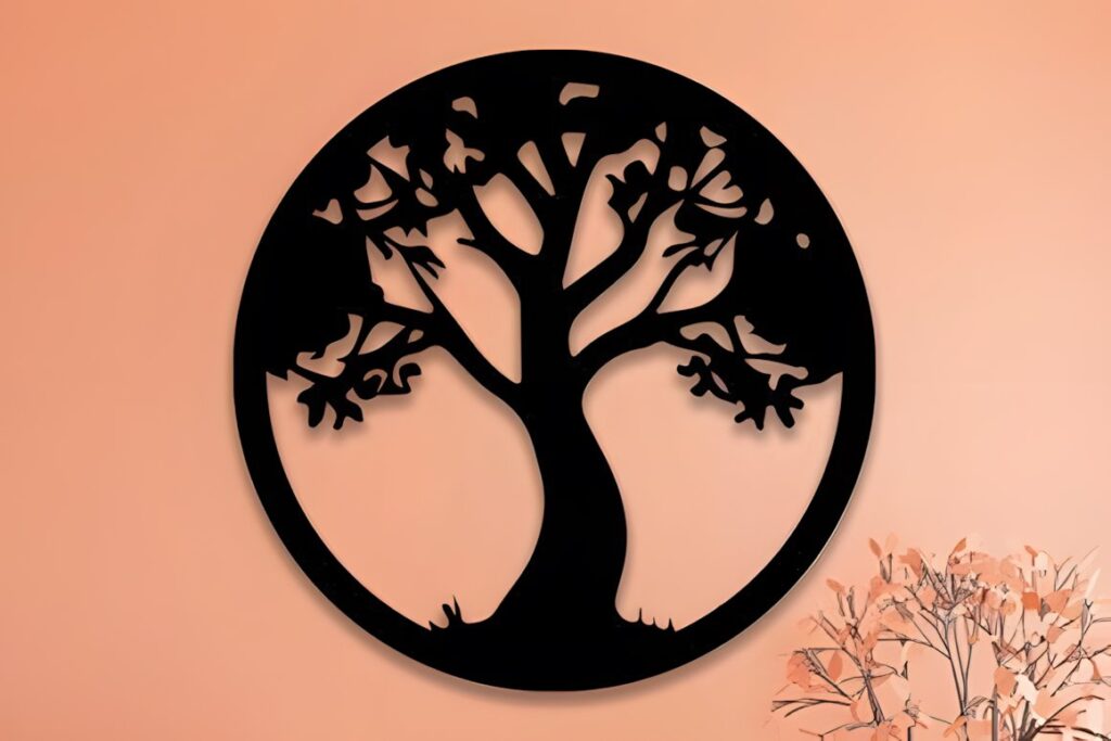 27 Laser Cut Wood Wall Art Ideas for Modern Home Decor 25 Laser cut wood wall art ideas featuring a black tree silhouette in a circular frame on a peach wall