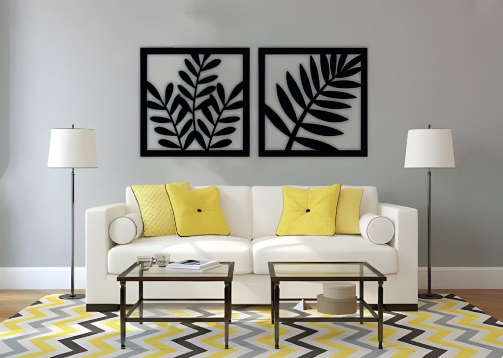 29 Laser Cut Metal Wall Art Ideas for Modern Home Decor 20 laser cut metal wall art ideas with two black botanical leaf designs above white sofa