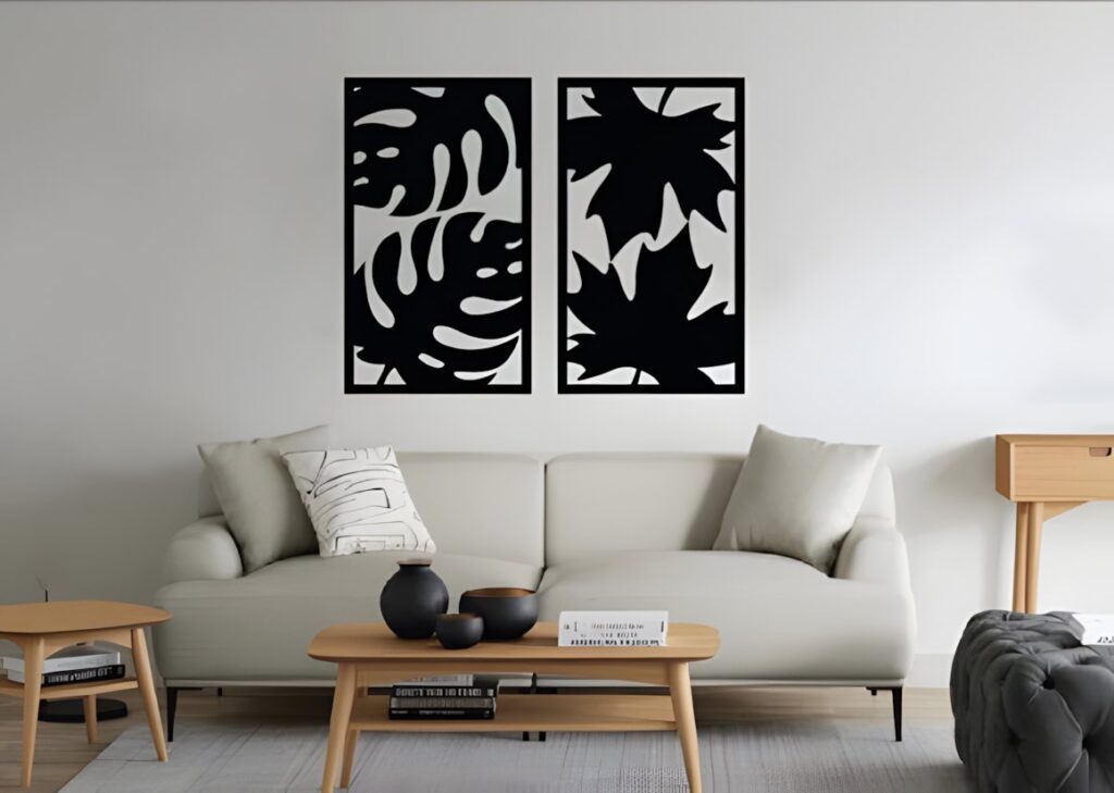 47 Laser Cut Wall Art Ideas for Stylish Home Interiors 60 Laser cut wall art ideas featuring black botanical leaf silhouettes with open negative space above a modern sofa