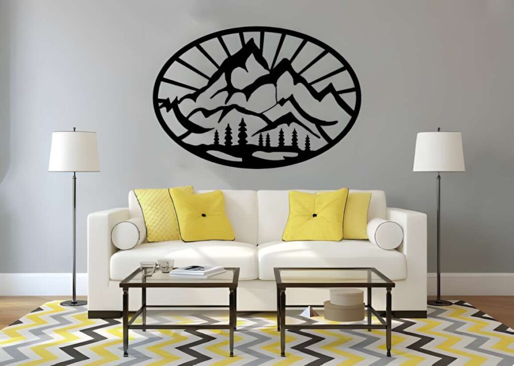 50 Laser Cut Steel Wall Art Ideas for Modern Home Decor 29 laser cut steel wall art ideas featuring a mountain landscape in black metal above a white sofa with yellow cushions