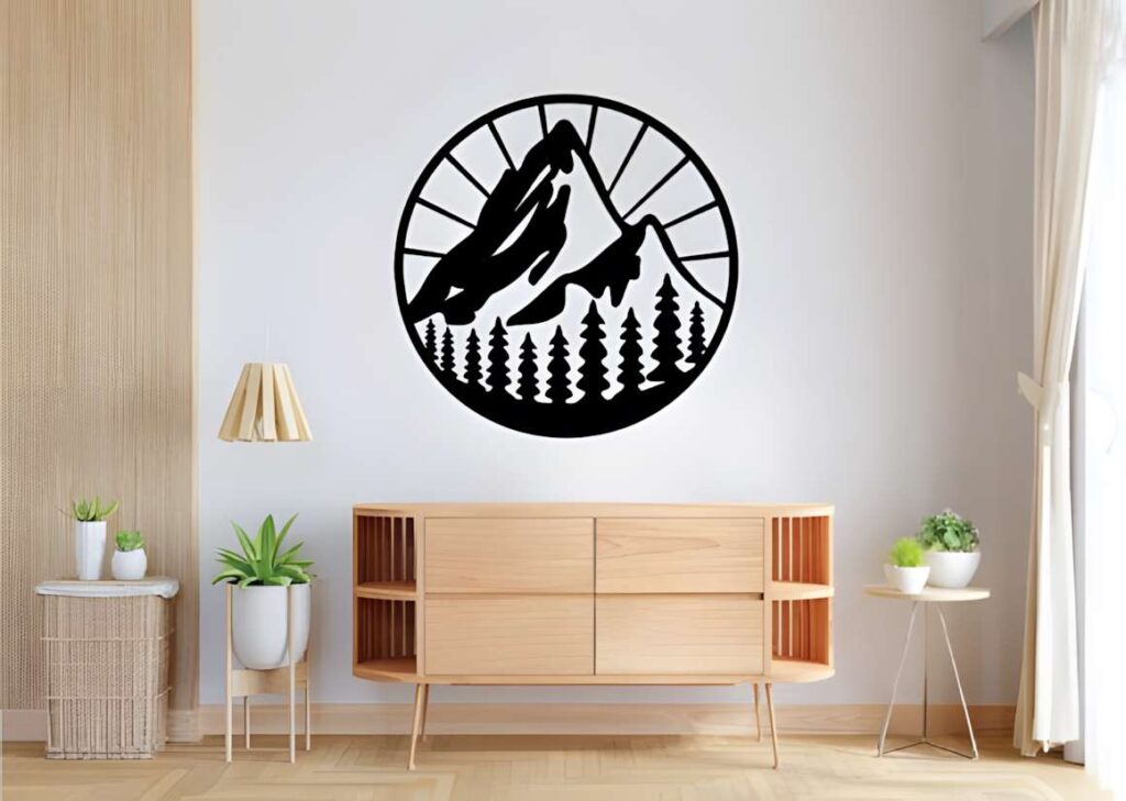 50 Laser Cut Steel Wall Art Ideas for Modern Home Decor 21 Mountain laser cut steel wall art ideas showing a circular silhouette of mountains and trees above a wooden sideboard in