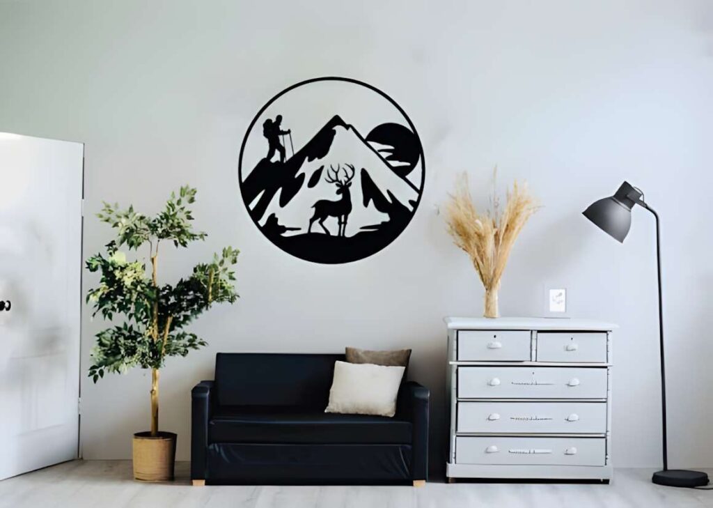 50 Laser Cut Steel Wall Art Ideas for Modern Home Decor 25 laser cut steel wall art ideas showing mountain silhouette with hiker and deer in black metal