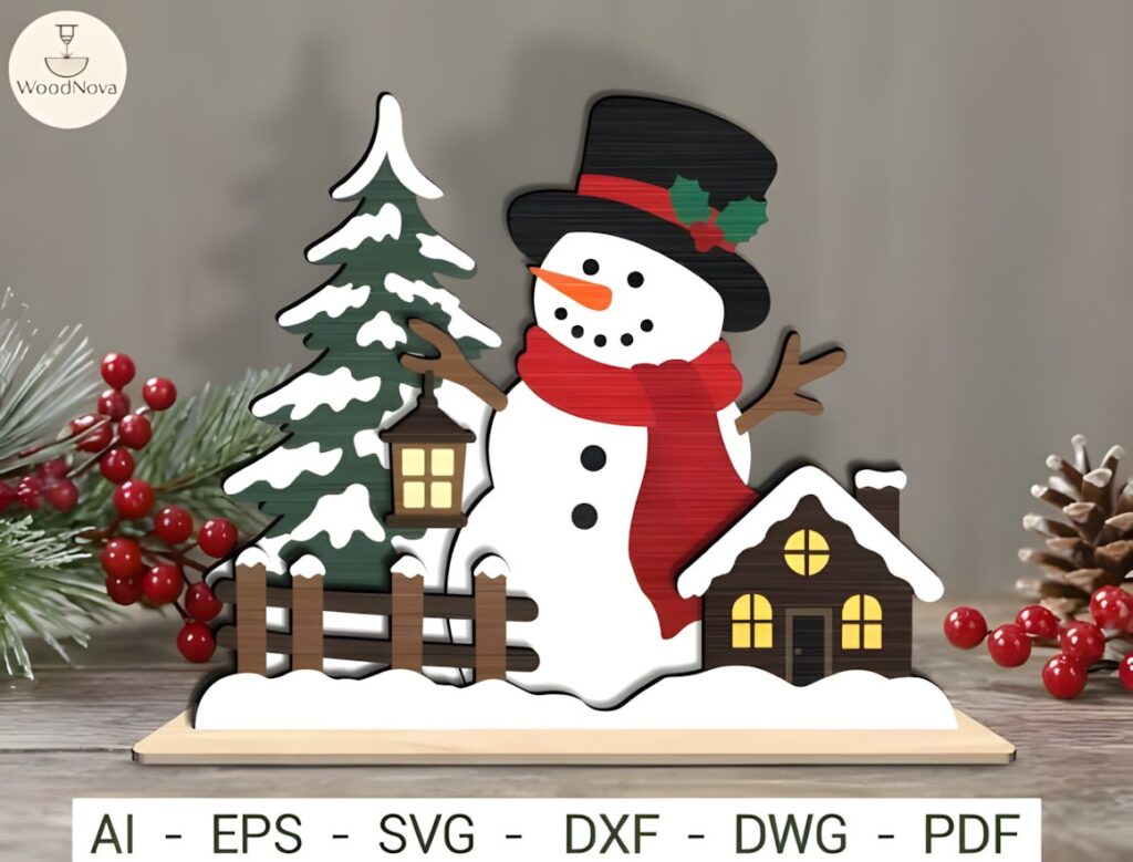 54 Christmas Laser Cut Files for Festive Laser Projects 72 Christmas Laser Cut Files snowman decor with tree, cabin, fence, lantern, and snowy landscape on wooden base