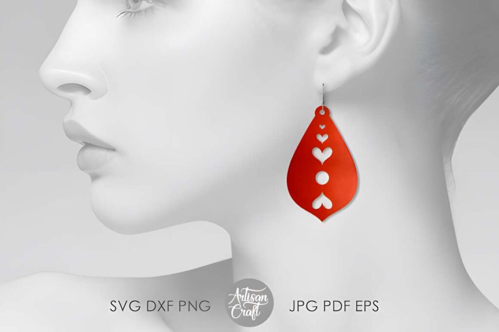 Laser Cut Teardrop Earring SVG Bundles Laser cut teardrop earring SVG bundles shown as red teardrop earring with heart cutouts worn on ear