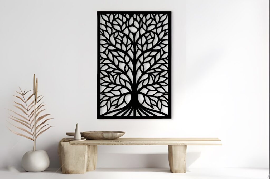 29 Laser Cut Metal Wall Art Ideas for Modern Home Decor 27 Laser cut metal wall art ideas featuring a black tree panel with intricate leaf and branch design on a white wall