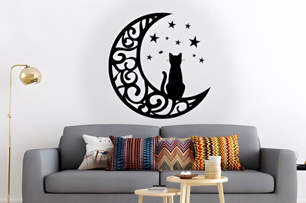 47 Laser Cut Wall Art Ideas for Stylish Home Interiors 48 Laser cut wall art ideas featuring a black moon silhouette with a cat and stars above a gray sofa with colorful cushions